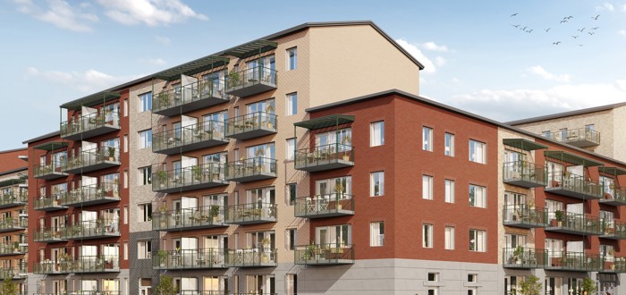Tegelfasad med balkonger och fönster från gatuvy