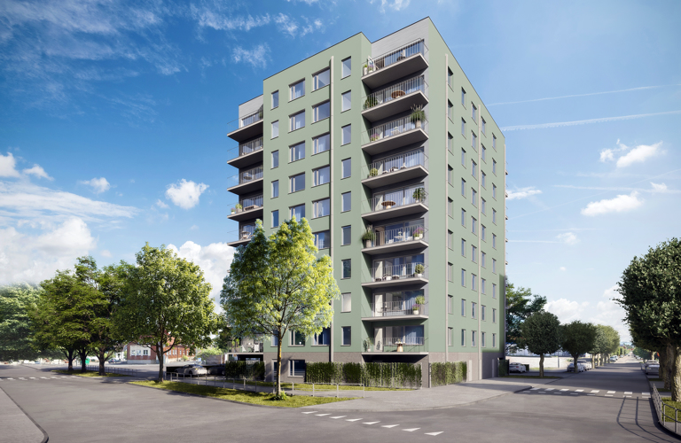 Grön fasad med fönster och balkong från gatuvy